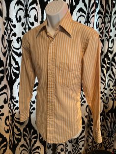 No label, soft af vintage button down mod / Rockford files / Stephen Malkmus / You This is a really comfortable shirt and it is totally perfect for reeling or rocking. Business or pleasure.  Butterscotch color with white and blue stripes. Feels good,like home. Pit to pit it's about 20.5 check the pic. Casual Vertical Stripes Shirt For Fall, Striped Collared Shirt For Fall, Fall Striped Collared Shirt, Fitted Striped Button-up Shirt, Fall Striped Button-up Shirt, Fall Button-up Shirt With Vertical Stripes, Fall Pinstripe Button-up Shirt, Fitted Button-up Shirt With Vertical Stripes, Fitted Vertical Stripe Button-up Shirt