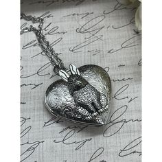 This unique necklace features a heart-shaped locket set in antique bronze metal. The locket contains a beautiful photo of a bunny rabbit, measuring 18mm in width and length. The necklace is 24" long and comes with a free chain, making it a great addition to any jewelry collection. The pendant is handmade and features a resin cameo design, adding depth to the bunny's cute and playful appearance. The necklace is signed by the brand Fancy Fox and is a perfect statement piece for any fashion-forward individual. The necklace is perfect for any occasion and is sure to bring a smile to anyone's face. SEE OUR STORE FOR MANY MANY DIFFERENT TYPES OF GIFTS  WE ALSO CARRY BOLO TIESCAMEO JEWELRYWESTERN JEWELRYWESTERN WEARANTIQUESPRECIOUS MOMENTSVINTAGE FISHING LURESVINTAGE HARLEY PARTSVINTAGE MOTORCYCL Chain Making, Types Of Gifts, Bronze Metal, Unique Necklace, Jewelry Pendant, Locket Necklace, Boutique Jewelry, Heart Jewelry, Unique Necklaces