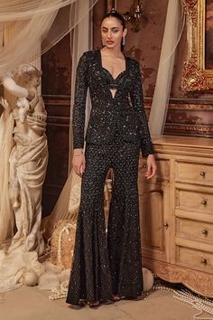 Black jacket with sequin, cutdana, thread embroidery in floral pattern. Paired with hand embroidered bustier and flared pant. - Aza Fashions Embroidered Bustier, Net Embroidery, Black Bustier, Embroidered Pants, Blazer Set, Embroidered Jacket, Black Hand, Pants Pattern, Pant Set