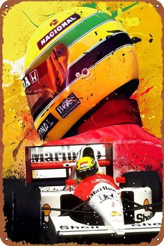 a man sitting in a racing car on top of a yellow and red background with the number 24