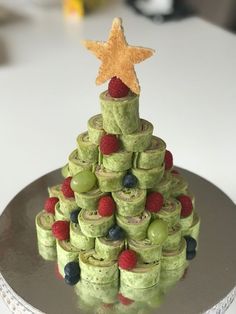 a christmas tree made out of rolled up cookies