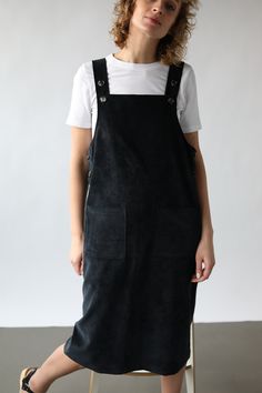 Black Suspender Dress For Fall, Black Sleeveless Pinafore Dress For Fall, Black Spring Pinafore Dress For Work, Spring Black Pinafore Dress For Work, Black Cotton Pinafore Dress For Spring, Casual Black Cotton Pinafore Dress, Black Dungaree Dress, Black Dungaree, Cord Pinafore Dress