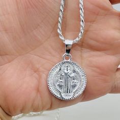 ❤️ 925 Sterling Silver Saint Benedict  ❤️ Rope necklace 24" long 2.5mm  ❤️ Saint Benedict medallion measures 23 mm ❤️ Cadena y dije en plata auténtica  ❤️ San Benito medalla en plata mide 23 milímetros  ❤️ Cadena de lazo mide 24 pulgadas y 2.5 milímetros de ancha  ❤️ Plata 925 SKU 0112674 Silver Medallion Rope Chain Jewelry, Silver Medallion With Rope Chain, Silver Medallion On Rope Chain Jewelry, Silver Medallion Rope Chain Necklace, Saint Benedict, Rope Necklace, Sterling Silber, Pendant Necklaces, Jewelry Necklace Pendant