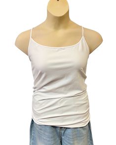 This basic, one size seamless plus size cami tank in white is made for relaxing afternoons or perfect for layering under your favorite kimono or jacket! Featuring a neutral white color paired with a relaxed scoop neck and sleeveless cut, it's so easy to style! With the longer style, you can easily throw this on with shorts and sandals and wear by itself, or layer it with a cute kimono or cardi on chilly nights! One Size fits XL to 2XL Material: 92% Nylon; 8% Spandex *Please note that our sizes a Spring Tops With Built-in Bra For Relaxation, Casual Camisole With Built-in Bra For Relaxation, Casual Tank Top With Built-in Bra For Relaxation, Spring Camisole With Built-in Bra For Relaxation, Solid Stretch Camisole For Everyday, White Scoop Neck Tank Top With Built-in Bra, Basic Everyday Camisole, Basic Spaghetti Strap Tank Top For Loungewear, Stretch Tank Tops For Relaxation