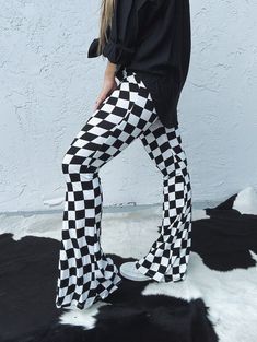 Queen's Gambit Checkered Print Bell Bottom Flare Pants Black Sweater Bell Bottoms, Black Bell Bottom Shoes, Cute Checkard Pants, Cute Checkered Jeans, Checkered Flag Pants, Checkered Clothes Womens Fashion, Checkered Bell Bottom Pants Outfit, Bell Bottoms And Combat Boots, Checkered Bell Bottom Pants