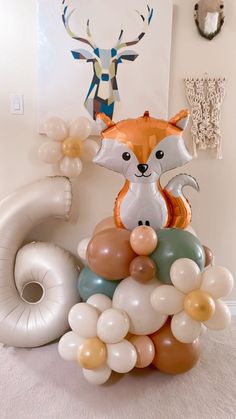 an assortment of balloons in the shape of animals