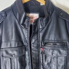 Mens Levis Faux Leather Sherpa Lined Jacket Brand New Never Worn With Original Tags Zipper Enclosure Snap Enclosure Non Smoker Home Has Snap And Zipper Enclosures #Levis #Sherpa Levi's Biker Outerwear For Winter, Levi's Biker Style Winter Outerwear, Levi's Biker Leather Jacket For Winter, Levi's Leather Jacket For Winter, Black Leather Jacket With Fleece Lining, Winter Black Leather Jacket With Faux Front Pockets, Black Leather Jacket With Faux Front Pockets For Winter, Winter Streetwear Outerwear With Faux Front Pockets, Levi's Leather Jacket With Pockets For Winter