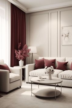 a living room filled with white furniture and red pillows