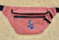 "Kynd Bags Fanny Pack with \"Pink Rollerskate\" for sale! Kynd Bag Descriptions: Material: Corduroy Design: Pink Rollerskate 3 zippers total: 2 located in the front, 1 located in the back Waist size ranges from 27.5\" to 42\" Fits you phone, keys, money, credit cards, headphones, and more! Please feel free to message me with any questions you may have!" Trendy Pink Belt Bag With Zipper Pocket, Trendy Pink Belt Bag With Pockets, Casual Belt Bag With Pockets For Streetwear, Casual Pink Belt Bag For School, Trendy Pink Bag For Streetwear, Bags Pink, Bum Bag, Cute Bag, Waist Bag