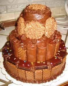 a large chocolate cake sitting on top of a table