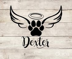 a dog paw with angel wings and the word dexter on it