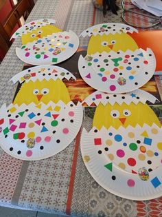 paper plates with different designs on them sitting on a table