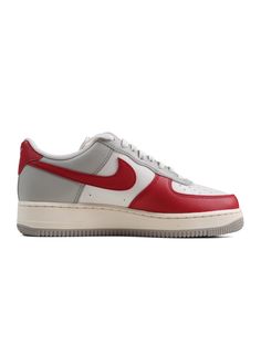 Discover the Nike Air Force 1 Low in a refined Light Iron Grey, Pale Ivory, and Phantom palette. Crafted with smooth and tumbled leather, ripstop tongues, and a mesh inner lining for exceptional comfort, this version features vibrant Gym Red accents on the Swoosh logos, heel tabs, and toe overlay. The two-tone AF1 rubber sole enhances its distinctive “Red Toe” look. Nike Air Force 1 Classic Leather With Cushioned Footbed, Classic Leather Nike Air Force 1, Classic Leather Sneakers With Padded Tongue, University Red Nike Air Force 1 With Branded Insole, Mens Air Force 1, Mens Air Force, All Jordans, Nike Air Force 1 Low, Nike Mens