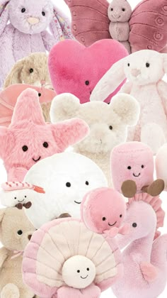 several stuffed animals are arranged in a pile