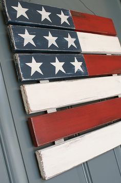 an american flag painted on the side of a building