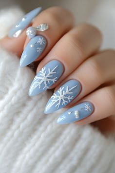 Elegant 2024 Christmas nails featuring festive designs. The first set displays sparkling silver nails with red glitter tree branches, adding a holiday twist. The second showcases icy blue nails with silver snowflakes and pearls, capturing winter's beauty. The final design offers a bold red look with white snowflakes and glitter, perfect for a festive celebration. A mix of glitter, glossy finishes, and intricate decorations makes these nail ideas perfect for your holiday inspiration.  #ChristmasNails #HolidayNailArt #FestiveNails #GlitterNails #NailDesign2024 #WinterNailInspo #SnowflakeNails #RedAndSilverNails #BlueNails #NailTrends2024 #HolidayManicure Simple Winter Nail Ideas, Matte Christmas Nails, Simple Winter Nails, Cute Layers, Red And Silver Nails, Winter Nail Ideas, Silk Wrap Nails, Acrylic Ideas, Nail Prices