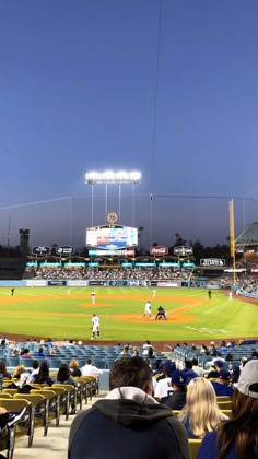 a baseball game in progress with the batter up to plate