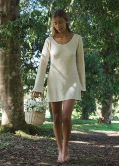 Introducing the Paloma Dress, a cozy and feminine short knitted dress. With its scoop neckline and long sleeves, this dress elegantly showcases your décolletage while offering a comfortable fit. The subtle flare in the sleeves and hem adds playful movement, making this dress both beautiful and functional. Whether worn for a casual outing or a special event, the Paloma Dress is versatile enough to be styled year-round. Available in Cloud Cream and Truffle, this piece is a must-have for your wardrobe. Cozy short knitted dress with long sleeves Scoop neckline to showcase your décolletage Subtle flare in sleeves and hem for playful movement Comfortable fit that follows your curves without clinging Versatile for various occasions and easy to style Available in Cloud Cream and Truffle Sizes: XS/ Cozy Cream Long Sleeve Dress, Cozy Long Sleeve Cream Dress, Spring Mini Sweater Dress For Loungewear, Chic Fall Dress With Scoop Neck, Chic Crew Neck Loungewear Dress, Cozy Knit Mini Length Dress, Cozy Knit Mini Dress, Cozy Long Sleeve Mini Dress For Spring, Cozy Beige Spring Dress