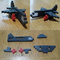 some legos are laying on a wooden table and one is made to look like an airplane