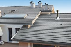 the roof of a house with solar panels on it