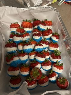 strawberries with white and blue frosting are arranged in the shape of american flags