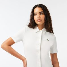 Enjoy iconic Lacoste style in this premium polo dress with sophisticated finish details. A new wardrobe essential. Classic Short Sleeve Polo Dress For Work, Classic Polo Dress With Polo Collar, Classic Short Sleeve Polo Dress, Classic Short Sleeve Summer Polo Dress, Classic Short Sleeve Polo Dress For Summer, Elegant Spring Workwear Polo Dress, Elegant Spring Polo Dress For Work, Classic Formal Shirt Dress With Collared Neckline, Elegant Fitted Polo Dress For Work