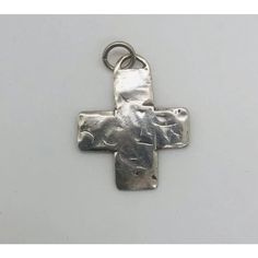 This stunning set of six handcrafted antique cross pendants showcases unique styles inspired by Native American design, all made from sterling silver. Each piece is attributed to T. Foree, though they are not signed by the designer.  Dimensions: Largest Cross: 3.75" H x 1.75" W Silver Symbolic Cross Necklace, Artistic Hammered Sterling Silver Jewelry, Artisan Hand Forged Cross Jewelry, Handmade Symbolic Crucifix Jewelry, Sterling Silver Oxidized Crucifix Necklace, Oxidized Sterling Silver Cross Pendant Necklace, Handmade Sterling Silver Cross Pendant Necklace, Nickel-free Sterling Silver Cross Pendant Necklace, Gift Sterling Silver Cross Necklace With Oxidized Finish