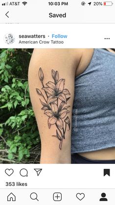 a woman's arm with flowers tattooed on it