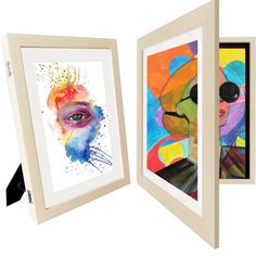 two framed art pieces, one with a woman's face and the other with a man's eye