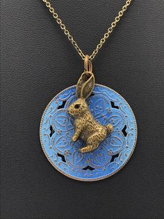 This beautiful random s rabbit charmed necklace has a dazzling textured background with a blue and bronze color on a 18 inch chain. Blue Goldstone Jewelry, Blue And Bronze, Rabbit Charm, Saw Tool, Island Lake, Blue Goldstone, Pendent Necklace, Star Ruby, Moon Charm