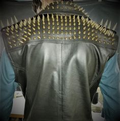 Gold Studded VEST JACKET HANDMADE Men Black Punk Silver Long Spiked Studded Leather Buttons Up Vest Golden Studs and Spikes Black Leather Made to Orders Studs Spike Studded Jacket made with 100 % Genuine Top Quality Cowhide Leather Golden Studded High Quality Studs. Each securely added by hand Cropped, Vintage - Inspired / Moto / Fit 0.9 to 1.0 MM Cowhide Leather used Soft Black Real Leather All sizes Available (Over XL Size 40$ will Charged till 4XL and above size 60$ ll be charged more) Make s Black Spiked Outerwear For Biker Events, Black Leather Jacket With Spikes For Biker Events, Alternative Spiked Leather Jacket For Biker Events, Alternative Leather Jacket With Spikes For Biker Events, Alternative Black Outerwear With Spikes, Black Spiked Biker Jacket For Biker Events, Black Biker Jacket With Spikes For Biker Events, Black Riveted Outerwear For Cosplay, Black Spiked Alternative Biker Jacket