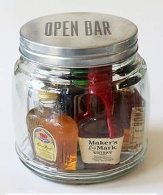 an open jar filled with different types of liquor