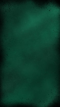 a dark green background with some stains on it