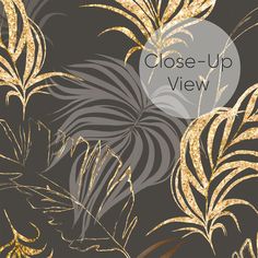 close up view of gold leaves on a black background with the words close - up view