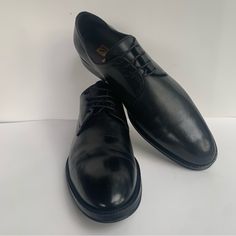 #Classy #Luxury Black Plain Toe Derby In Calf Leather, Black Plain Toe Calf Leather Derby Shoes, Black Calf Leather Derby With Plain Toe, Black Calf Leather Derby Shoes With Plain Toe, Luxury Black Dress Shoes For Business, Luxury Black Moc Toe Oxfords, Luxury Black Derby Shoes With Rubber Sole, Luxury Black Derby With Rubber Sole, Luxury Black Derby With Branded Insole