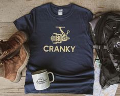 Cranky T-shirt, Funny Fishing Shirt, Fishing Reel Tee, Fisherman Gift, Fisher Man Tee, Fishing Dad Gift, Fish Lover Unisex Heavy Cotton Tee At Flooka Shop, we pride ourselves on high-quality designs and a great customer experience. If there are any questions that you have or wish to see this design on another product type, then please do not hesitate to contact us and we will communicate with you directly as soon as possible. For more great shirts, please visit our shop: https://www.etsy.com/sho Fisher Man, Bass Fishing Shirts, Funny Fishing Shirts, Funny Fishing, Fisherman Gifts, Fishing Humor, Fishing T Shirts, T Shirt Funny, Fishing Shirts