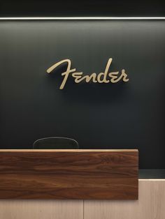 the name fenderer is mounted on the wall