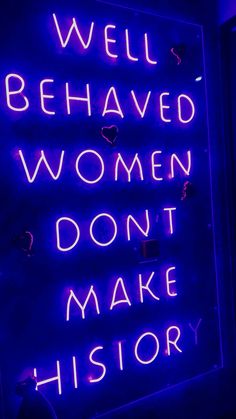 a neon sign that says well behaved women don't make history