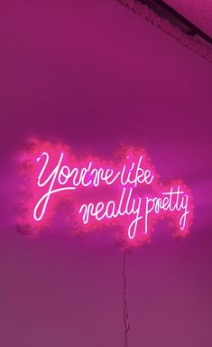 a neon sign that says you're like really pretty