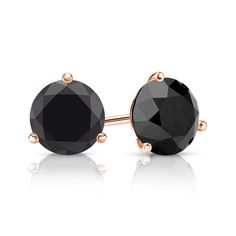 Black diamond stud earrings are a modern trend on a timeless fashion staple. These 2 carat tw black diamond studs are bold, with each round circle cut diamond earring weighing 1 carat each. Set in the 3 prong martini setting, available with lever back or push backings set in 14kt Rose Gold for a perfect combination of rich colors. Making these rose gold studs a perfect gift. Black Diamond Stud Earrings, Round Diamond Stud Earrings, Black Diamond Pendant, Martini Set, Black Diamond Earrings Studs, Black Diamond Studs, Halo Diamond Earrings, Solitaire Diamond Pendant, Black Diamond Earrings