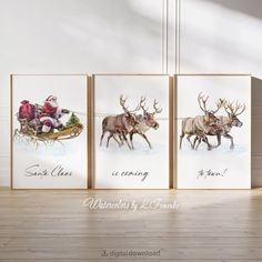 three christmas cards with santa claus and reindeer pulling sleighs on snow covered ground