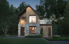 a small house is lit up at night