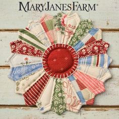 the cover of mary jane farm's book, quilting with fabric and appliques