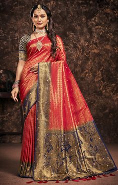 This Saree is Ready to Wear (With Fall and Pico Done). A designer saree Red & Blue in color. It has intricate design all over the saree. This saree is a suitable amalgamation of style and grace that is required from an ethnic wear. The saree is ideal for any formal gathering. The saree comes with an unstitched blouse of corresponding color and design as shown in the picture. Silk Designer Red & Blue Color Saree Fabric Type: SilkPrimary Color: RedSecondary Color(s): -Blue & GoldenSaree Length: 6.0 meters including 0.8 meter blouseBlouse Material: Matching Silk (Same as picture)Washing Instructions: Dry Clean Only Blue Color Saree, Burgundy Weave, Saree Red, Kanchipuram Silk Saree, Purple Silk, Red Colour, Saree Look, Designer Saree