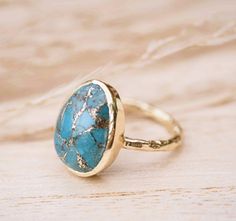 Admiring our Barbara Ring in all it's angles! 😍 Copper Turquoise is natural Turquoise that has been crumbled and reformed to add copper to it, in order to create the beautiful effect of the stone! Would you wear this ring? 👇🏻