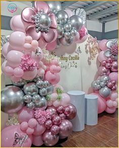 balloons and flowers are on display at an event