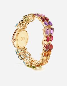 Find DOLCE & GABBANA Watch With Multi-colored Gems on Editorialist. Dial. 263 brown round diamonds Bracelet. 2 oval “Sky”, 2 round blue topaz, 2 oval “London” topaz, 2 cushion-cut “Swiss” topaz, 2 round intense-purple amethysts, 2 rectangular purple amethysts, 2 round green tourmalines, 2 oval pink tourmalines, 2 round “Madera” quartzes, 2 oval citrines, 2 oval peridots, 2 oval cabochon essonites, 2 oval green tourmalines, 2 cushion-cut green quartzes Bezel. 3 round “London” topaz, 2 round “Swiss” topaz, 2 round “Sky” topaz, 2 round peridots, 5 round green tourmalines, 1 round “Lemon” quartz, 1 round “Champagne” quartz, 2 round citrines, 1 round “Madera” quartz, 1 round essonite, 3 purple/red rhodolite garnets, 2 round pink tourmalines, 4 round purple amethysts, 1 round Green quartz Crown. London Topaz, Diamonds Bracelet, Expensive Jewelry Luxury, Dope Jewelry, Classy Jewelry, Expensive Jewelry, Jewelry Lookbook, Colored Gems, Green Quartz