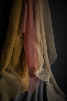 Ochre {Gossamer Silk Fabric} Hand-loomed, 100% organic silk fabric. This material has a unique body and texture. The light airiness of our gossamer silk creates a transparent veil of color when used for flatlay photography or vignette styling. Create a sculptural look when tucked and pinned. Creates a show-stopping look when draped on a table, or hanging as a backdrop. Planning a large event? Contact us for larger quantities here. Ochre Gossamer Silk Fabric has many uses! • Use as a transparent Sheer Fabric Texture, Narnia Oc, Transparent Veil, Fashion Draping, Vignette Styling, Flatlay Photography, Bespoke Invitations, Fabric Photography, Blue Napkins