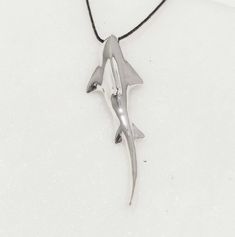 Shark Masculine Men's Pendant, Sculpture Solid Sterling Silver Unisex Pendant A statement men's handcrafted talisman, with beautiful organic form. Sharks are the object for mythological figures and awesome tales since they are steeped in mystery. While they are particularly common features of Hawaiian folklore, we find them in the mythology of the Australian Aboriginal people, Indonesian tribes and the Indians of North America. There are even some accounts of sharks in Greek mythology as Poseido Gift For Guys, Shark Pendant, Silver Shark, Shark Necklace, Handmade Sculpture, Aboriginal People, Surfer Necklace, Silver Surfer, Unisex Gift