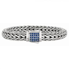 A thick wheat chain of textured and polished silver with a push-button clasp studded with sapphires. Length: 8.25" Royal Chain, Woven Chain, Woven Bracelet, Italian Jewelry, Sapphire Bracelet, Woven Bracelets, Fine Jewelry Designers, Design Silver, White Sapphire